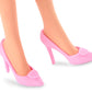 Barbie The Movie Doll Wearing Pink and White Gingham Dress with Daisy Chain Necklace.