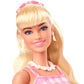Barbie The Movie Doll Wearing Pink and White Gingham Dress with Daisy Chain Necklace.