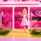 Barbie The Movie Doll Wearing Pink and White Gingham Dress with Daisy Chain Necklace.