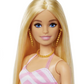 Blonde Barbie Doll with Swimsuit Beach-Themed Accessories.